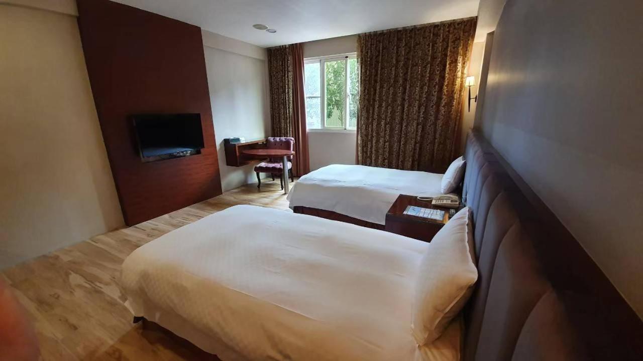 Chia Shih Pao Hotel Taibao Bagian luar foto